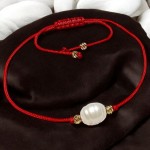 Bransoletka na bogactwo mądrość i szczęście bransoletka z perłą złote wykończenie 